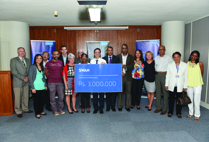 SWAN commémore la Journée Internationale de la Charité et remet Rs 3 millions à 13 ONG
